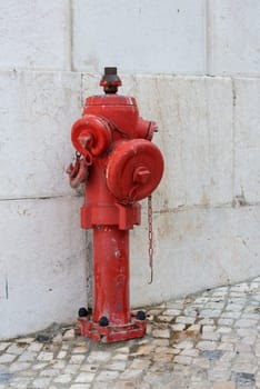 old red fire water hydrant in the city of Lisbon, the capital of Portugal