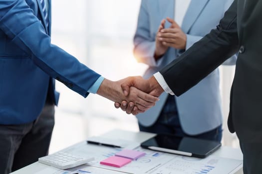 Business partnership meeting concept. Image business people handshake. Successful businessmen handshaking after good deal. Group support concept.