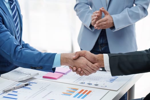 Business partnership meeting concept. Image business people handshake. Successful businessmen handshaking after good deal. Group support concept.