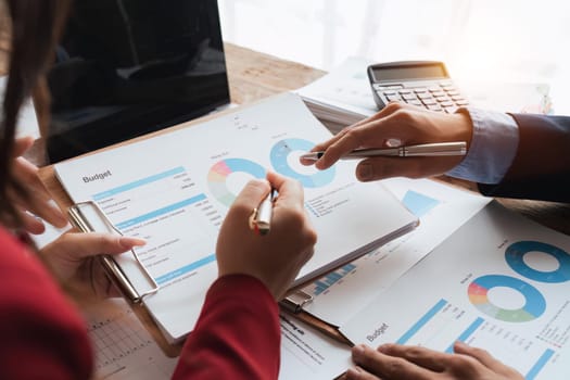 Business team collaboration discussing working analyzing with financial data and marketing growth report graph in team, presentation and brainstorming to strategy planning making profit of company.