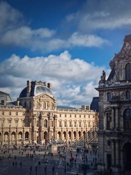 Louvre Museum territory, Paris, France. The famous palace site view vertical background