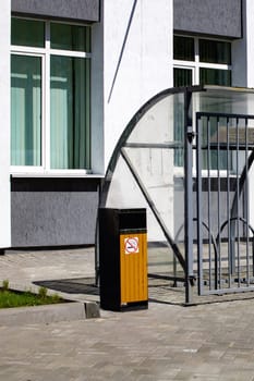 Closed empty bike parking near an office building close up