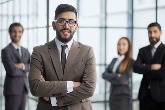 Portrait of successful diverse international business team friendly group of four coworkers