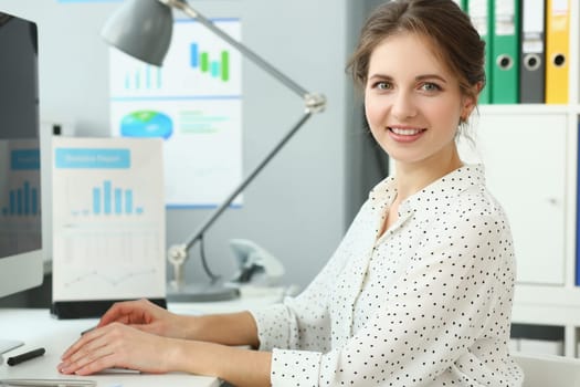 Portrait of beautiful businesswoman at workplace in office. Business consultant manager boss or marketer