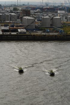 Black inflatable speed boats on the Elbe in Hamburg