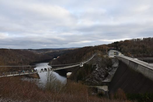 Dam wall of the Rappbode Dam and view of the Titan RT giant suspension bridge in the Harz Mountains