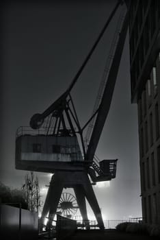 Grayscale shot of the Industrial crane in the port of Muenster, Germany