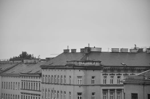 Greyscale shot of a classic old Viennese apartment house in Vienna, Austria