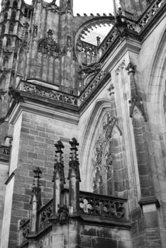 Vertical greyscale shot of the St. Vitus Cathedral at Prague Castle in Prague, Czech Republic