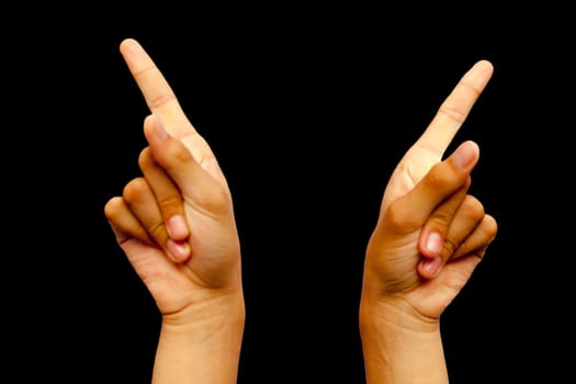 Shot of hands demonstrating Suchi Mudra isolated on black background.