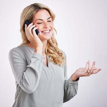Business, phone call and woman with a smile, talking and connection against a grey studio background. Female employee, person and happy consultant with a smartphone, communication and conversation.