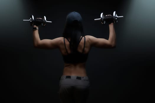 beautiful cute sports girl, fitness model, gym trainer, brutal, muscular athletic, bodybuilding lady sexy working out training pumping up muscles gaining weight and poses. healthy lifestyle