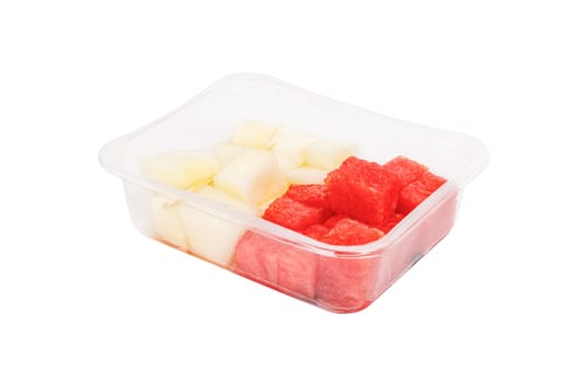 Fruit salad with watermelon and melon in a plastic container on a white background. High quality photo