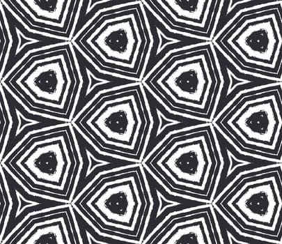 Geometric seamless pattern. Black symmetrical kaleidoscope background. Textile ready Actual print, swimwear fabric, wallpaper, wrapping. Hand drawn geometric seamless design.