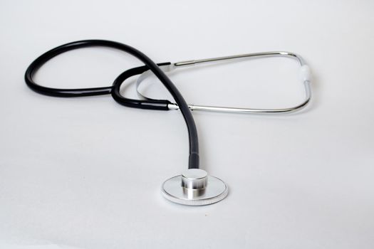 Stethoscope on a white background close up, medicine