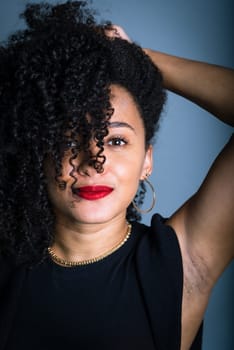 Close-up portrait of beautiful young woman with black hair. studio portrait