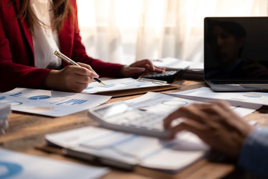 Group of young coworkers working together, business team work as team work, smart businessman and women brain storm idea knowledge information discussion thinking. High quality photo