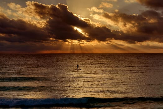 Sea beach with sky sunset or sunrise. Clouds over the sunset sea. Sunset at tropical beach. Nature sunset landscape of beautiful tropical sea.