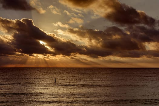 Sea beach with sky sunset or sunrise. Clouds over the sunset sea. Sunset at tropical beach. Nature sunset landscape of beautiful tropical sea.