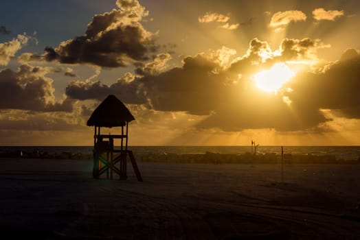 Sea beach with sky sunset or sunrise. Clouds over the sunset sea. Sunset at tropical beach. Nature sunset landscape of beautiful tropical sea.