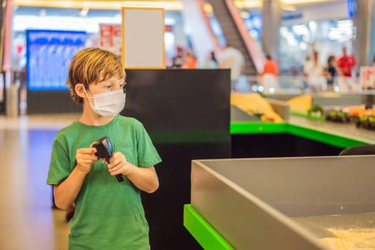 Adorable cute little child playing with toy on remote control, in the mall. Happy kid boy having fun. Leisure, lifestyle for kids concept.