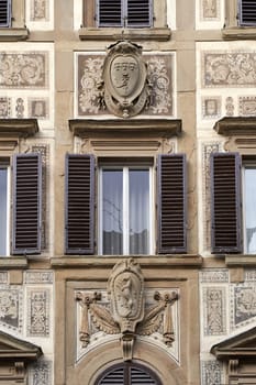 Beautiful architecture details of an old house in Florence, Italy