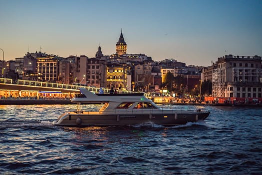 Istanbul city skyline in Turkey, Beyoglu district old houses with Galata tower on top, view from the Golden Horn.