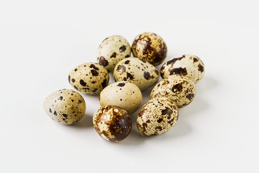 Quail eggs are isolated on a white background. small eggs. eco healthy food concept