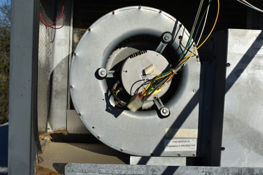 Inside of Rooftop Air Conditioner Blower Motor, Panel off for Repairs . High quality photo
