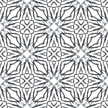Ikat repeating swimwear design. Black and white artistic boho chic summer design. Watercolor ikat repeating tile border. Textile ready pleasing print, swimwear fabric, wallpaper, wrapping.