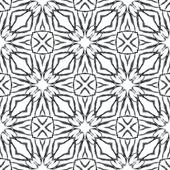 Ikat repeating swimwear design. Black and white artistic boho chic summer design. Watercolor ikat repeating tile border. Textile ready pleasing print, swimwear fabric, wallpaper, wrapping.