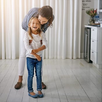 I got you. a mother and her daughter spending quality time at home