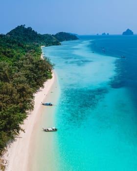 Koh Kradan Island with a white tropical beach and turqouse colored ocean in Thailand