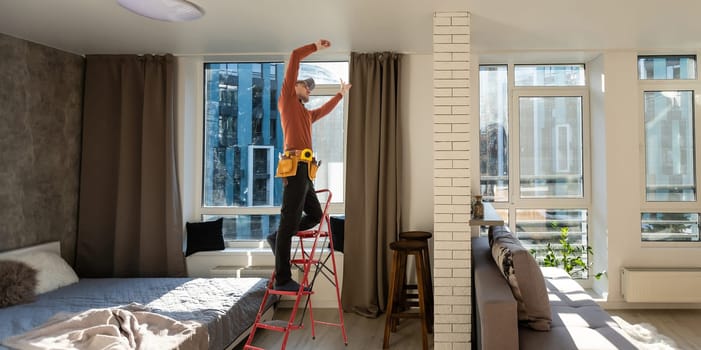 Man builder, repair works in apartment