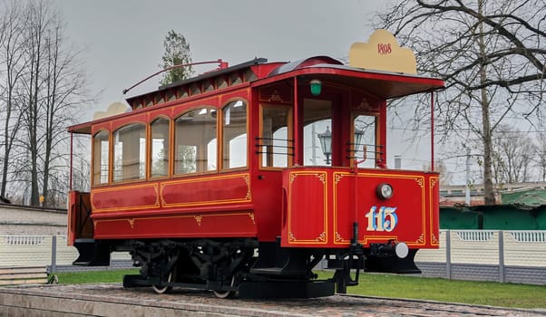 The famous old red tram. A retro tram stands on the street to attract tourists.