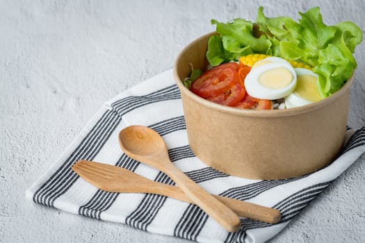 Fresh salad vegetable with boiled chicken egg for the concept of healthy eating and diet food.