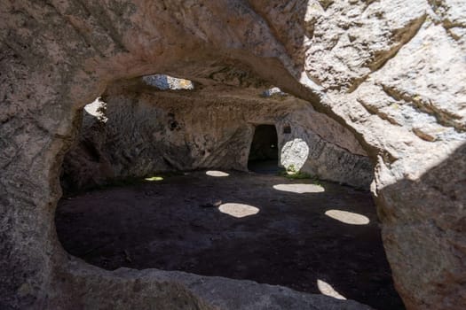 Ancient cave city. Inside the cave, view from the window