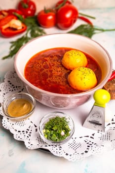 borscht with pampushki and garlic in the restaurant.