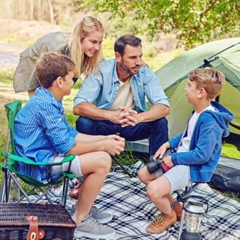 Sharing some camp stories. a family of four camping in the woods