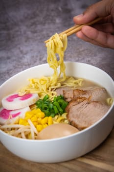 Fresh ramen noodles with garnish, pork tenderloin, eggs marinated in Mirin and soy sauce, bean sprouts, corn, nori leaf, spring onion, and homemade Narutomaki with codfish back, Hight quality