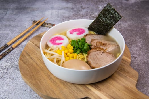 Fresh ramen noodles with garnish, pork tenderloin, eggs marinated in Mirin and soy sauce, bean sprouts, corn, nori leaf, spring onion, and homemade Narutomaki with codfish back, Hight quality
