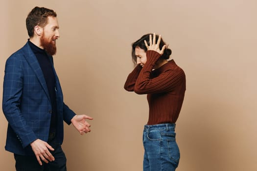 Man and woman couple in a relationship quarrel, yelling, psychological violence in the family, problems in a real relationship between people. High quality photo