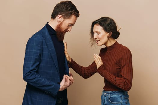 Man and woman couple in a relationship quarrel, yelling, psychological violence in the family, problems in a real relationship between people. High quality photo