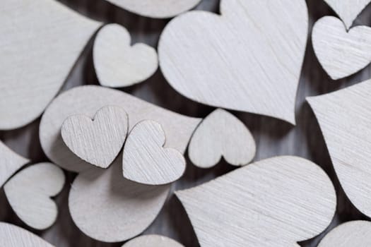 Many wooden colorless hearts background for Valentine day celebration design