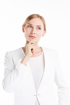 Portrait of mature pensive business woman in white suit isolated on white background