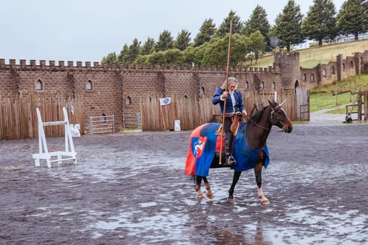 BALLARAT, AUSTRALIA - April 7 2023: Medieval horse show at the popular tourism destination of Kryal Castle which is a medieval village near the country Victorian town of Ballarat on a stormy autumn morning