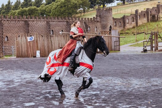 BALLARAT, AUSTRALIA - April 7 2023: Medieval horse show at the popular tourism destination of Kryal Castle which is a medieval village near the country Victorian town of Ballarat on a stormy autumn morning