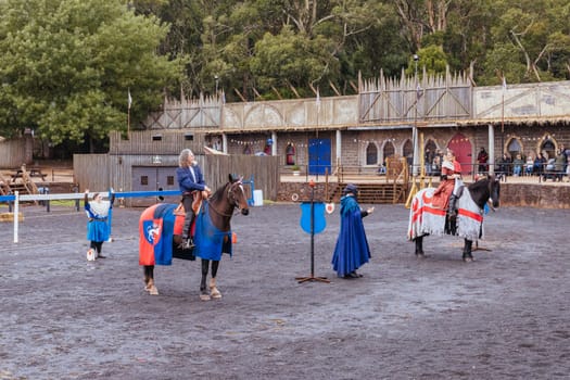 BALLARAT, AUSTRALIA - April 7 2023: Medieval horse show at the popular tourism destination of Kryal Castle which is a medieval village near the country Victorian town of Ballarat on a stormy autumn morning