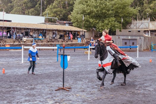 BALLARAT, AUSTRALIA - April 7 2023: Medieval horse show at the popular tourism destination of Kryal Castle which is a medieval village near the country Victorian town of Ballarat on a stormy autumn morning