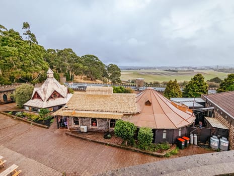 BALLARAT, AUSTRALIA - April 7 2023: The popular tourism destination of Kryal Castle which is a medieval village near the country Victorian town of Ballarat on a stormy autumn morning